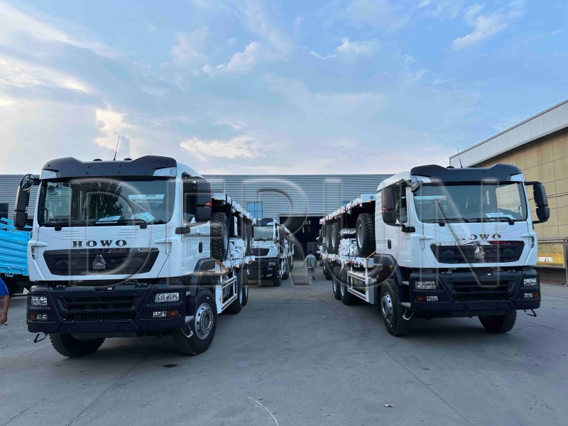 10 Einheiten Howo Tx Zaun Truck mit Fracht -Drawbar -Anhänger erfolgreich nach Äthiopien geschickt